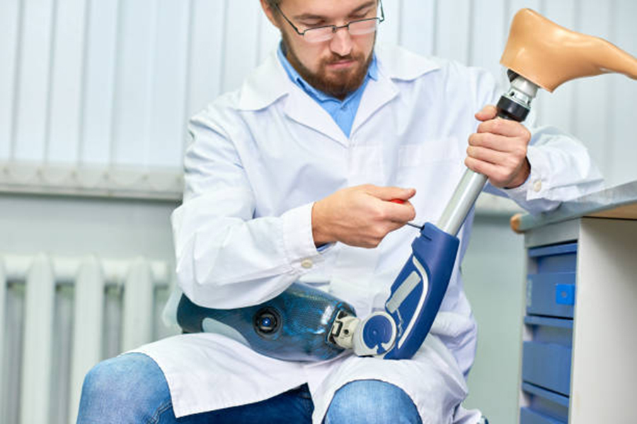technician adjusting prosthetic