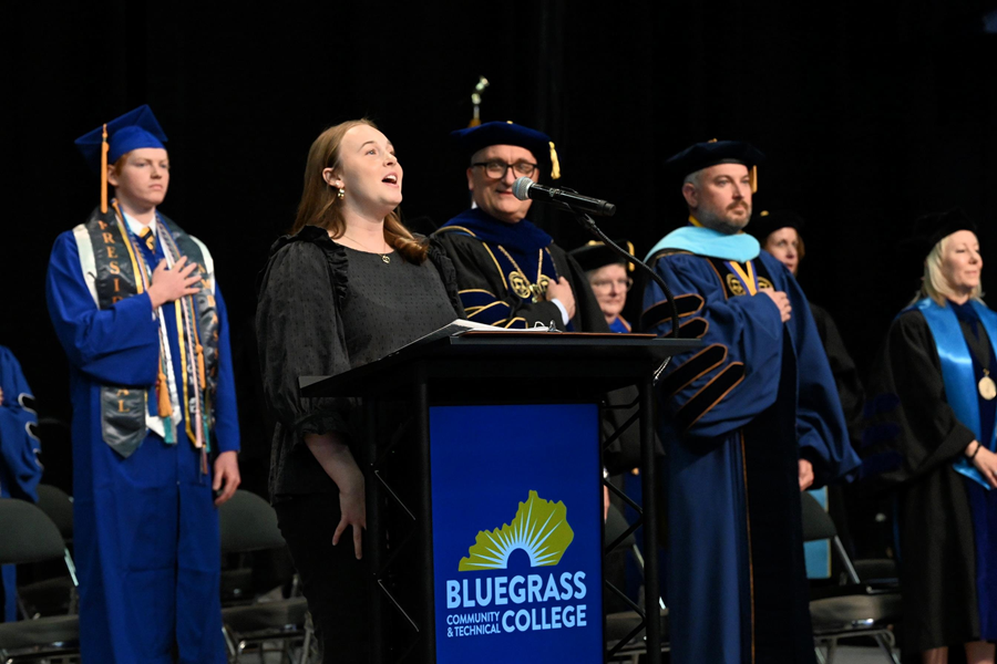 Bailey Simmons singing during 2025 Commencement